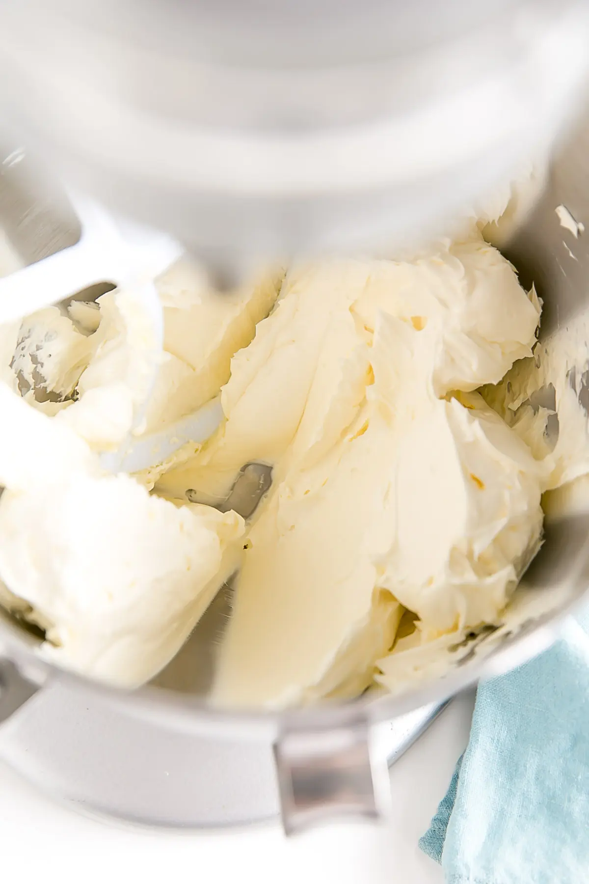 This custard-based German buttercream is made with just a few simple ingredients. Perfect for those who like a rich and silky frosting that isn't too sweet! | livforcake.com Butter whipped until it's pale and fluffy.