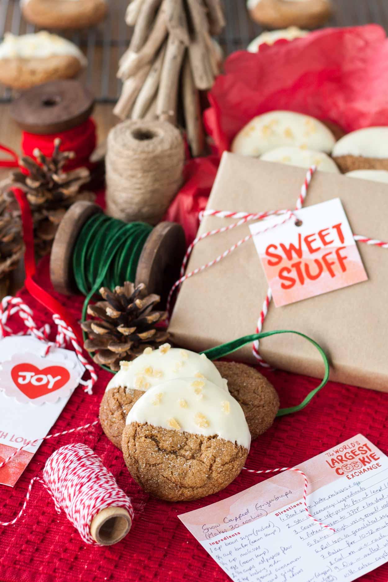 These Snow Capped Gingersnaps are the perfect Christmas cookies! Chewy gingerbread cookies dipped in white chocolate and topped with crystallized ginger. | livforcake.com These Snow Capped Gingersnaps are the perfect Christmas cookies!